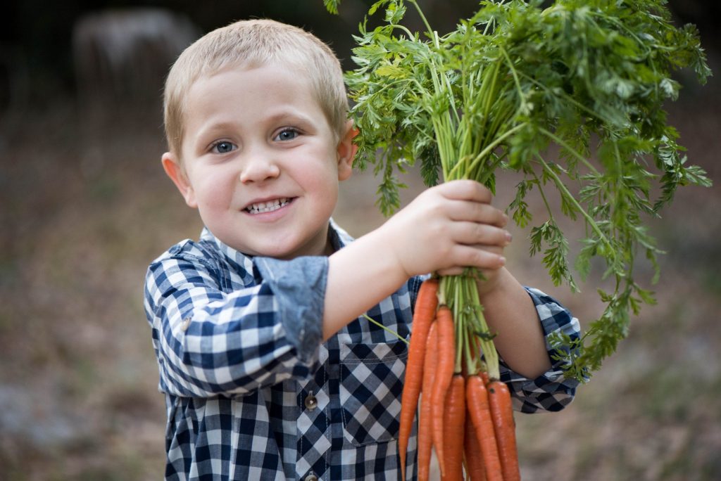 5 hands-on and super practical ways you can help your family love eating real (healthy!) food. These simple strategies don't require any tricks, hiding food, or secrets. Just simple ways to help your whole family enjoy the healthy food you make.