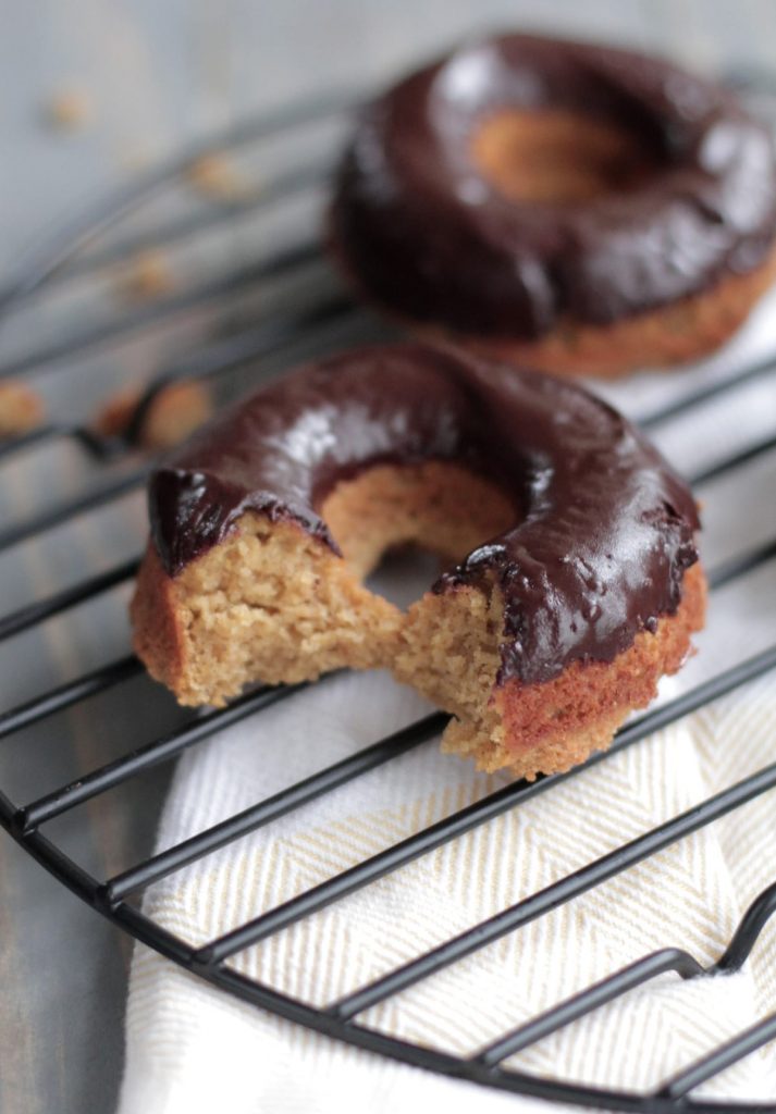 A healthy grain-free homemade pumpkin doughnut that's perfectly sweet and delicious. Made with no refined sugars and almond flour.