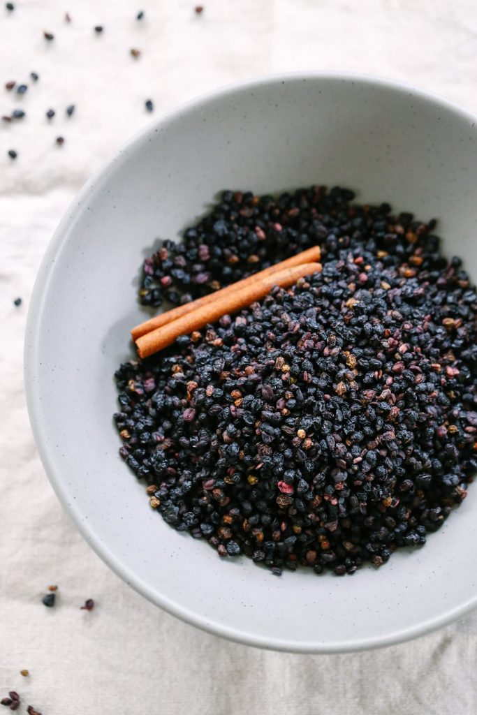 How to make the BEST homemade elderberry syrup. Plus, this recipe saves so much money when compared to purchasing immune-boosting elderberry syrup from the store. You can take this via a spoon or mix it in a smoothie.