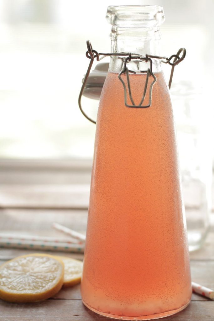 Homemade berry lemonade kombucha. A delicious, easy homemade probiotic drink.