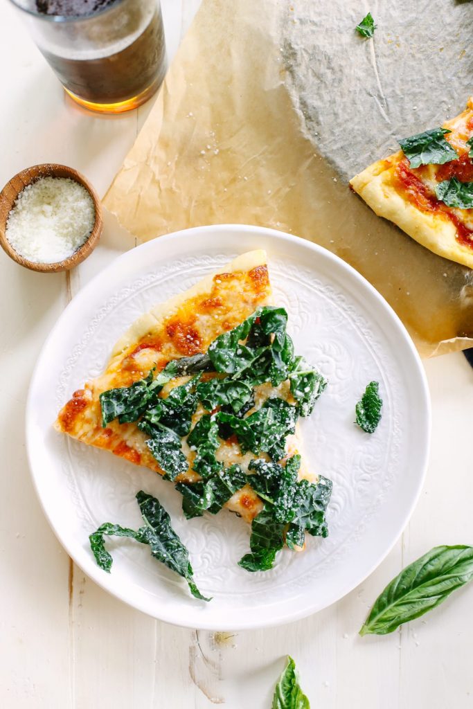 I'm not a huge kale fan, but this pizza is amazing! The kale has a lemon and garlic twist that pairs so well with the easy homemade pizza. Big family favorite! Feels gourmet, but it's super easy to make!