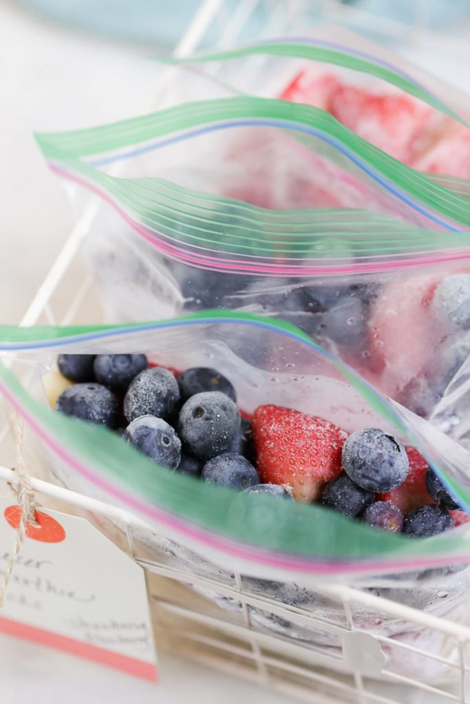 The Ultimate Guide to creating make ahead freezer smoothie packs. Make an entire week or even month of smoothie packs in just minutes.
