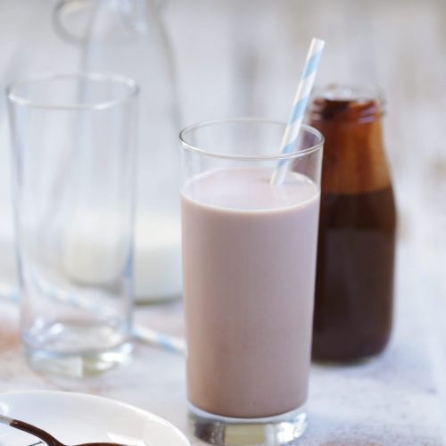 Homemade Chocolate Milk Syrup without refined sugars or artificial colors. The healthy, fun, and easy way to do chocolate milk.