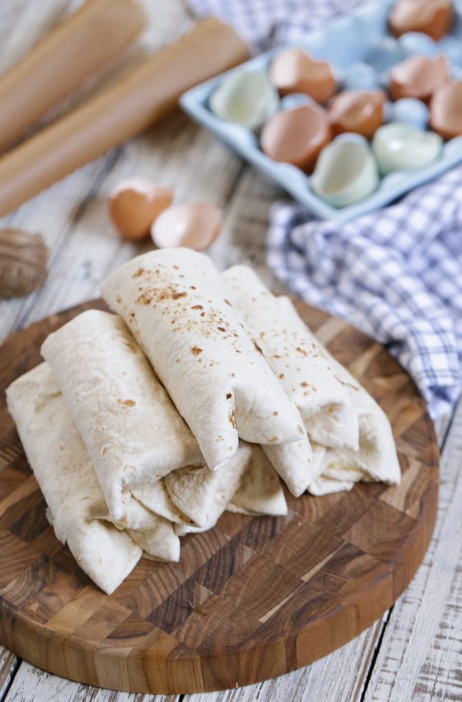 Super EASY and FREEZER-FRIENDLY make-ahead breakfast burritos. These burritos are made with healthy, real food ingredients to start your morning right! A family favorite. Perfect for busy weekday mornings.