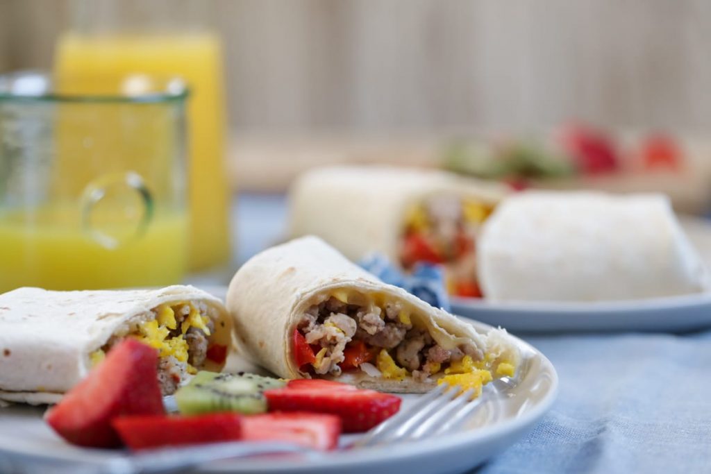 Super EASY and FREEZER-FRIENDLY make-ahead breakfast burritos. These burritos are made with healthy, real food ingredients to start your morning right! A family favorite. Perfect for busy weekday mornings.