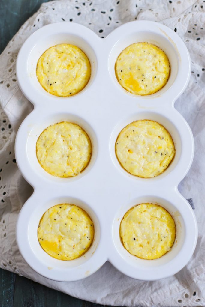 Homemade bacon, egg, and cheese biscuits made with real food! Zero boxed or processed food ingredients. Plus, these sandwiches can be made in advance and frozen for later. The perfect busy breakfast meal.