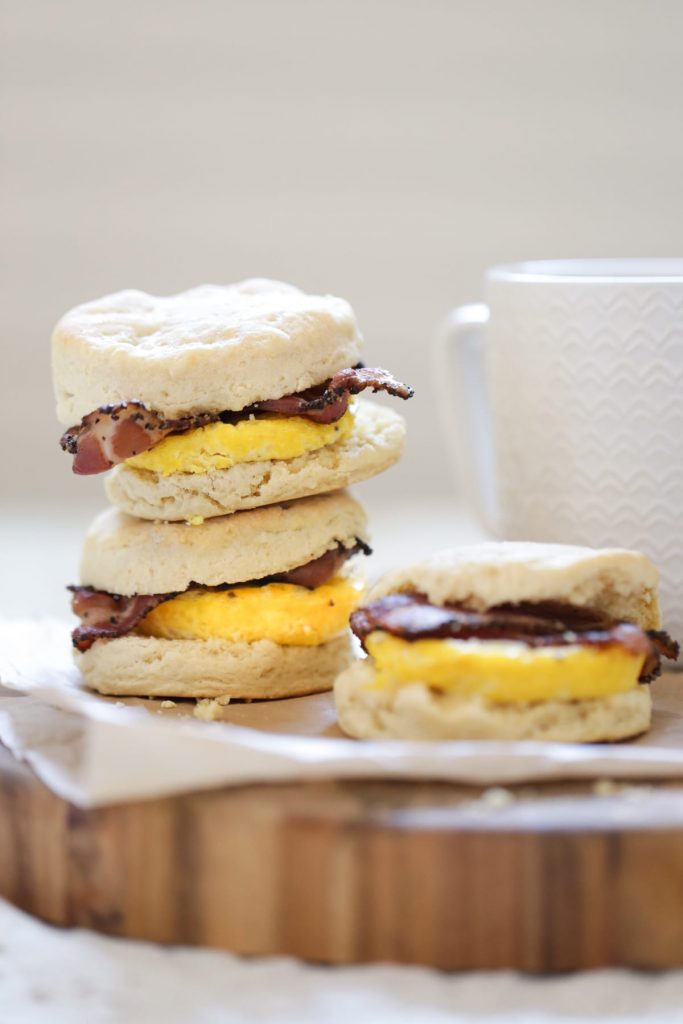 Homemade bacon, egg, and cheese biscuits made with real food! Zero boxed or processed food ingredients. Plus, these sandwiches can be made in advance and frozen for later. The perfect busy breakfast meal.