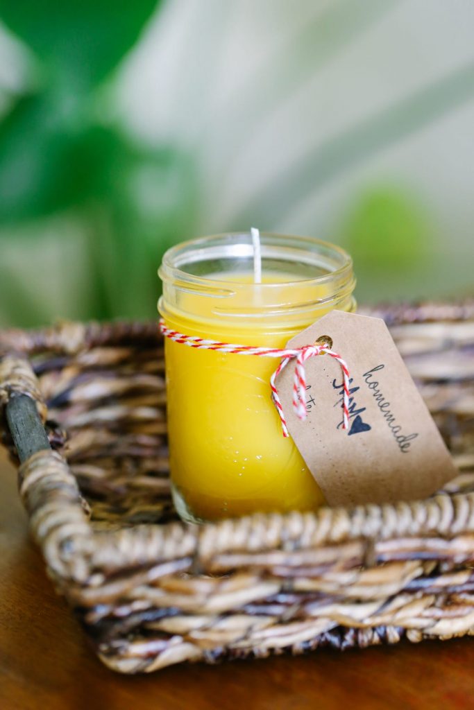 A super easy tutorial that shows you how to make your own homemade beeswax candles. They smell so good and can help clean the air in your home. Add essential oils for a beautiful custom scent.
