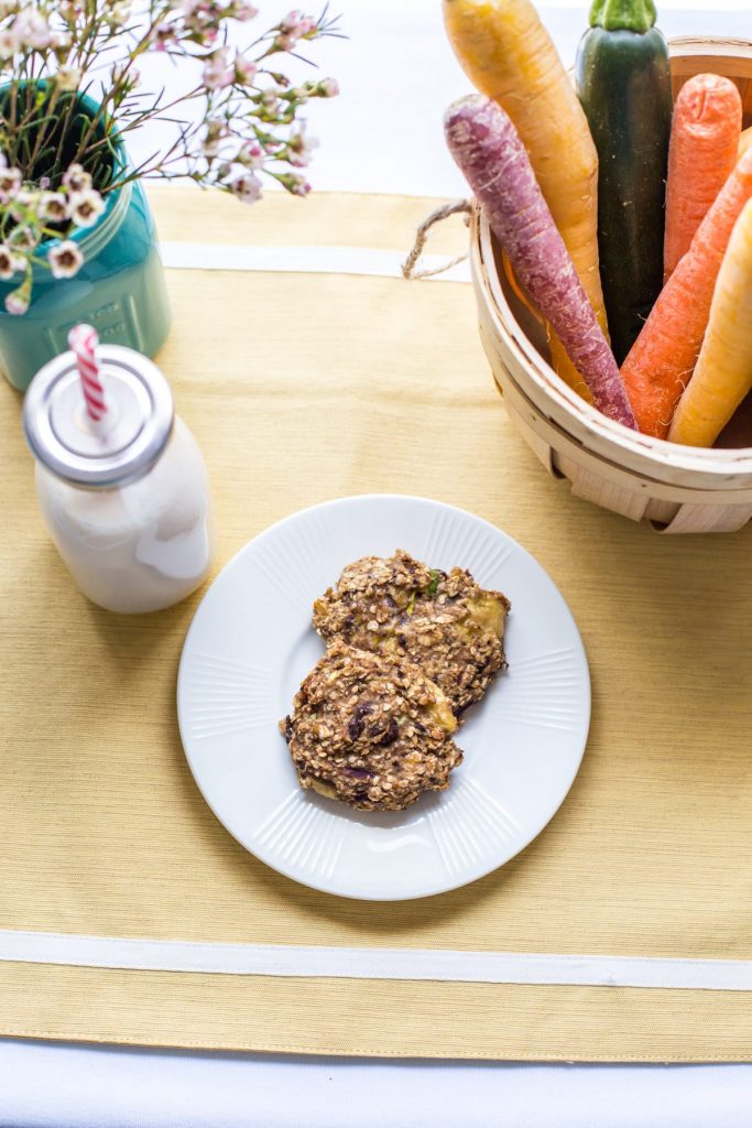 Gluten-Free Hidden Veggie Oatmeal Breakfast Cookies! These are a kid (and adult) favorite in our house. Plus, they are super easy to freeze for busy mornings. These cookies pack veggies, flax, and even a fun little treat!