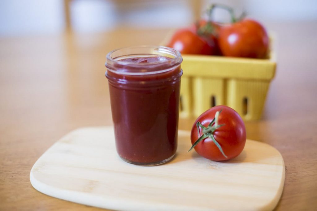 Fresh homemade ketchup without the nasty ingredients or processed sugar! Just place the ingredients in the pan, cook, and blend!