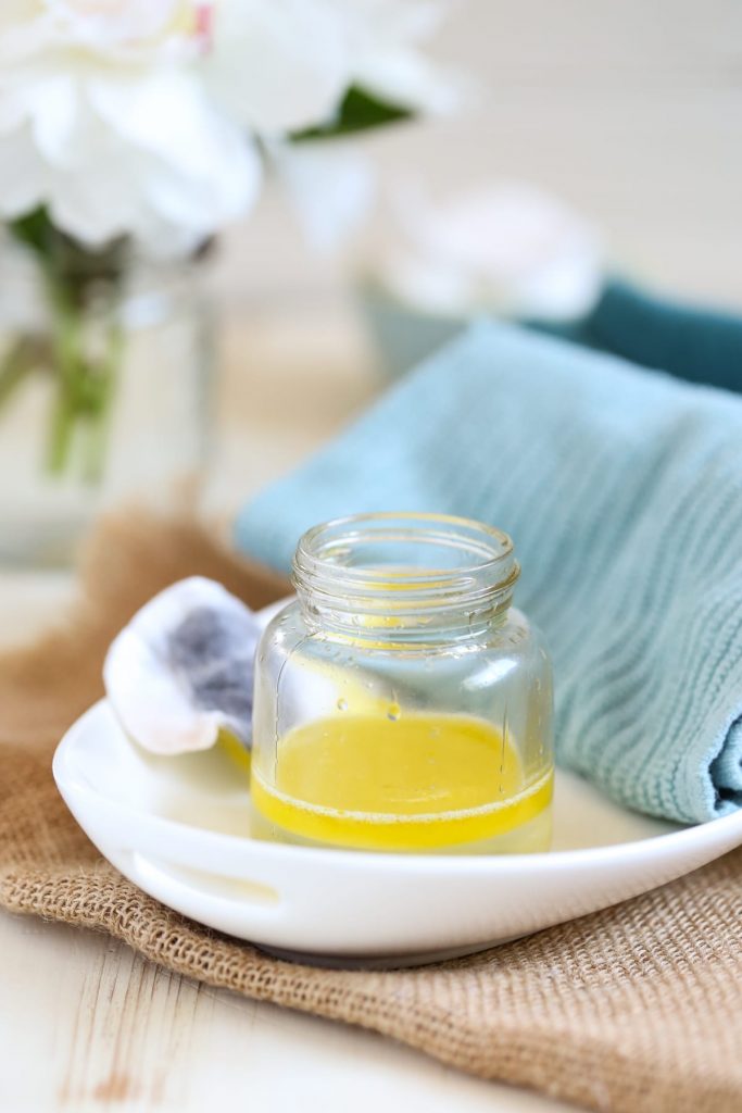 DIY Makeup Remover (without coconut oil). A simple two ingredient makeup remover that's gentle and effective. Costs just pennies to make one jar. No coconut oil in this recipe--just natural, simple and nourishing skincare ingredients.
