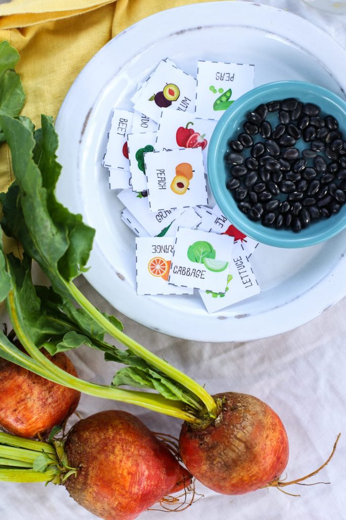 Teach your kids to love fruits and veggies with this free printable fruit and veggie bingo game!