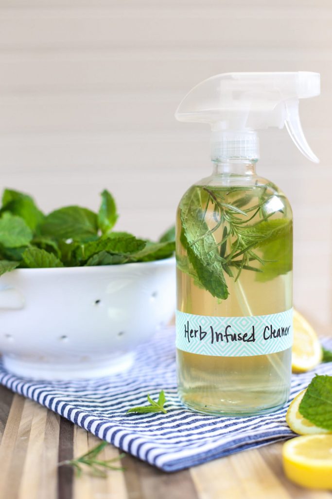 DIY homemade herb-infused cleaner! This all-purpose spray cleaner naturally cleans. No nasty ingredients! Super inexpensive.