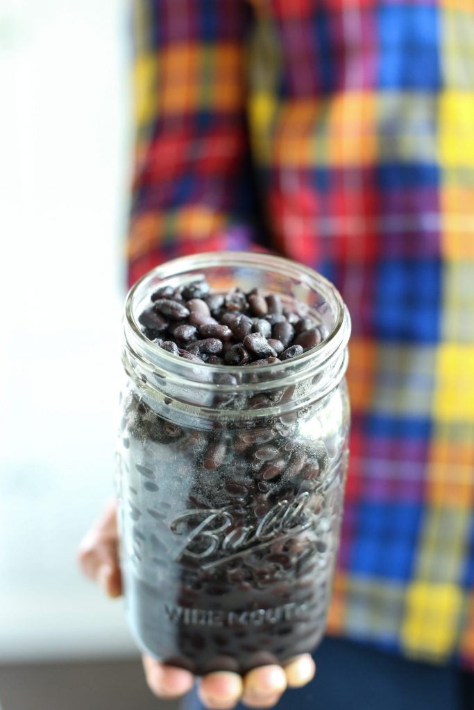 How to cook beans in the crock-pot and freeze them for later! This method is so easy and will extend the life of homemade cooked beans up to 3 months. Plus, ideas for using cooked beans. A healthy and affordable real food.