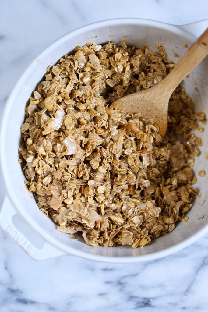 Easy Homemade Granola Recipe. Delicious over ice cream, yogurt or even all by itself! So simple to mix up and throw in the oven.