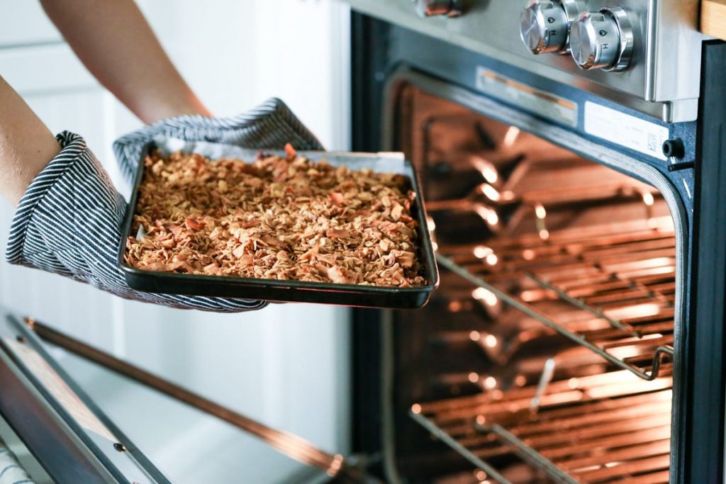 Easy Homemade Granola Recipe. Delicious over ice cream, yogurt or even all by itself! So simple to mix up and throw in the oven.