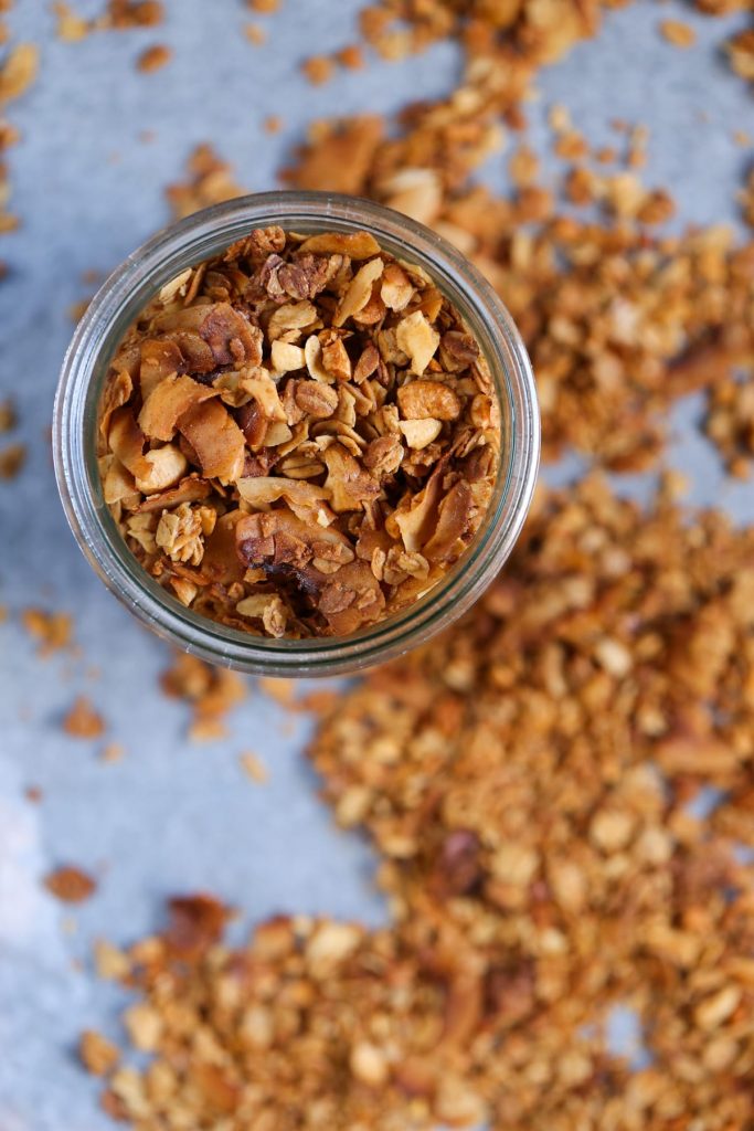 Easy Homemade Granola Recipe. Delicious over ice cream, yogurt or even all by itself! So simple to mix up and throw in the oven.