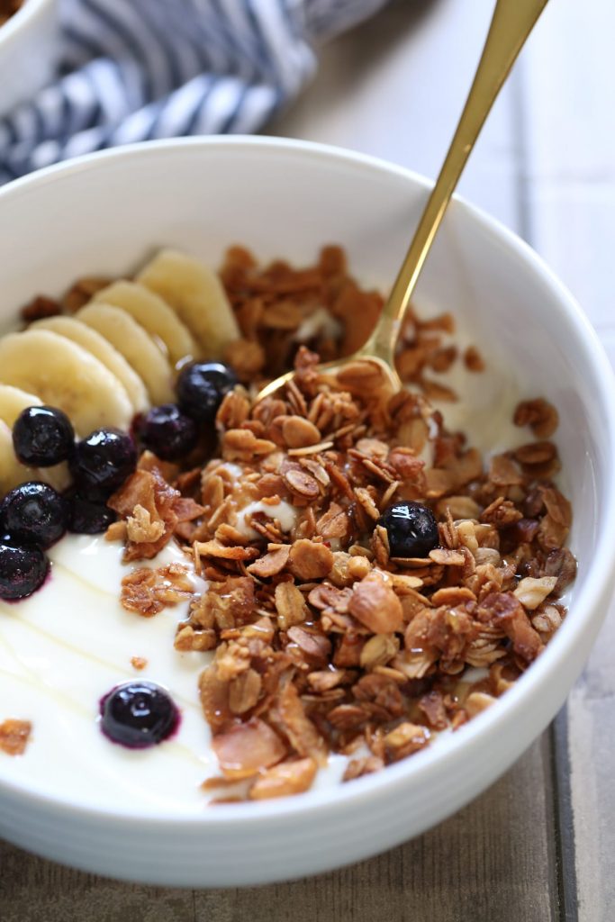 Easy Homemade Granola Recipe. Delicious over ice cream, yogurt or even all by itself! So simple to mix up and throw in the oven.