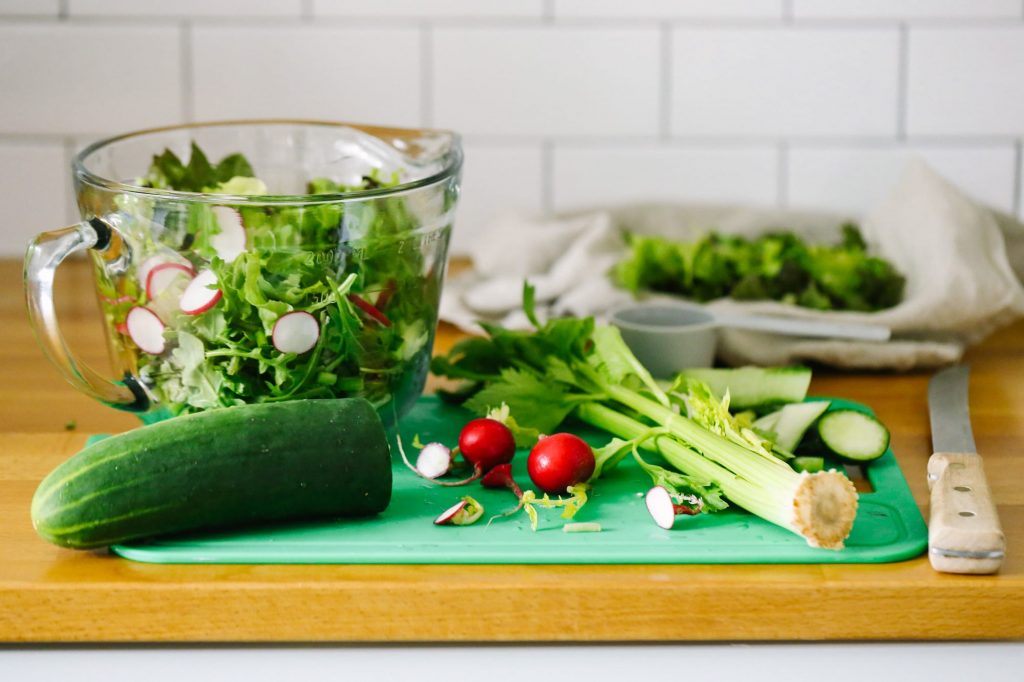 Easy Weeknight Salad with 3 Ingredient Homemade Dressing. So good! I serve this salad at least three times a week with dinner. Super inexpensive and takes less than 10 minutes to make everything, including the healthy dressing. Plus, tips for serving this salad to kids.