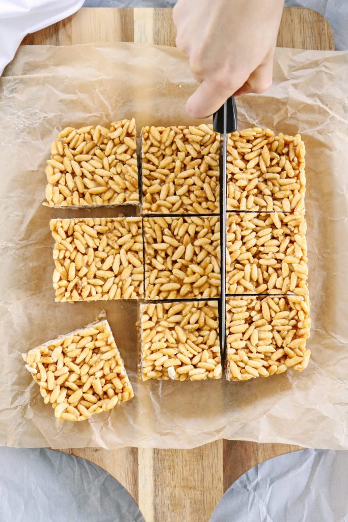 I CAN'T stop eating these crispy rice treats! Sooo good! Plus, they are made with 100% natural ingredients: puffed brown rice, honey, nut butter, butter, and vanilla extract. That's it! No bake, too.