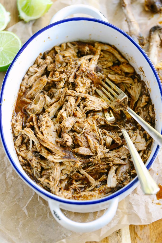 Crockpot Pulled Chicken Taco Meat. A super simple no fuss meal that's packed with flavor! No fancy ingredients or complicated steps.