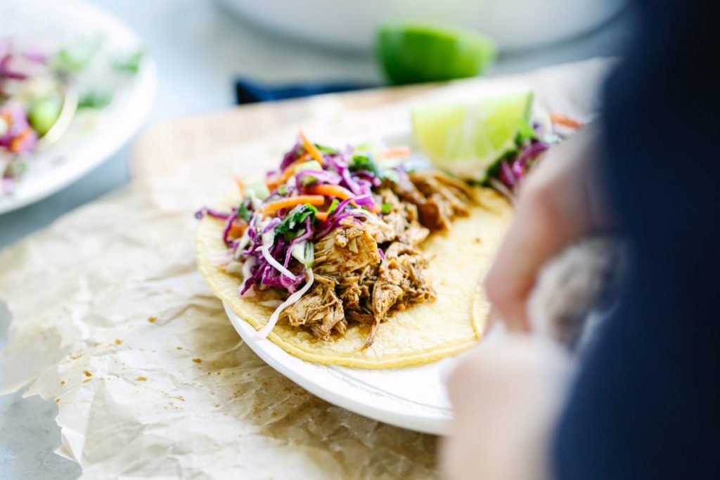 Crockpot Pulled Chicken Taco Meat. A super simple no fuss meal that's packed with flavor! No fancy ingredients or complicated steps.