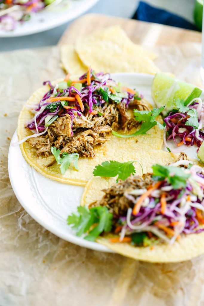 Crockpot Pulled Chicken Taco Meat. A super simple no fuss meal that's packed with flavor! No fancy ingredients or complicated steps.