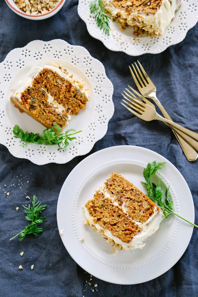 This Honey-Sweetened Applesauce Carrot Cake is made with natural sweeteners: honey, applesauce, and freshly-grated carrots. Seriously, it's soooo good!