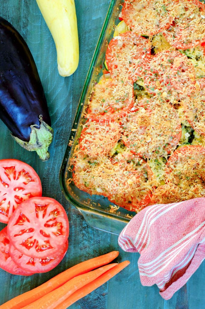 This summer vegetable casserole is a perfect easy dinner after a trip to the farmers market or to your backyard garden! Kids will love being involved in making, and eating, it.