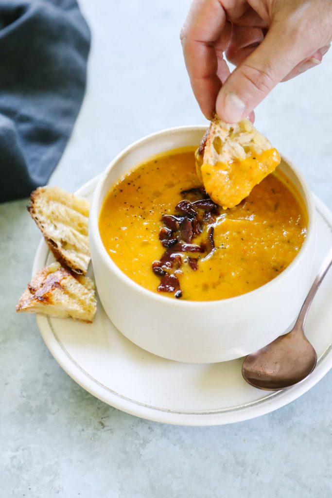 So good! This creamy roasted butternut squash soup is my absolute favorite fall soup, and it's so easy to make. Just roast and blend. No dairy!