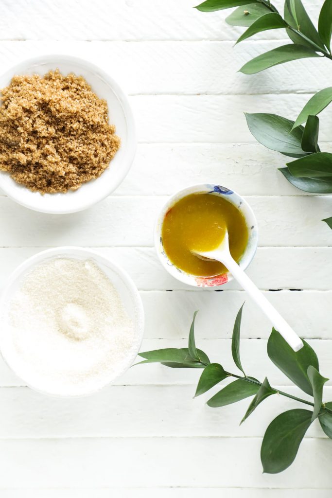 A simple two-ingredient exfoliator scrub made with sugar and oil. Sloughs away dead skin cells and hydrates the skin. Made with kitchen ingredients.