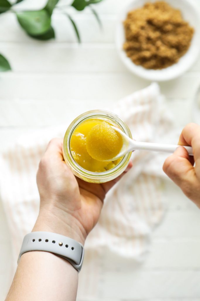 A simple two-ingredient exfoliator scrub made with sugar and oil. Sloughs away dead skin cells and hydrates the skin. Made with kitchen ingredients.
