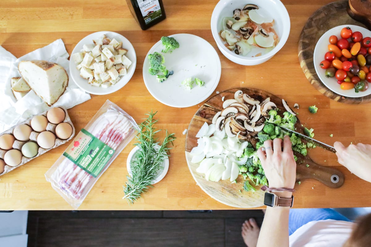 A make-ahead, one-skillet strata (egg and bread casserole) made with veggies and bacon.