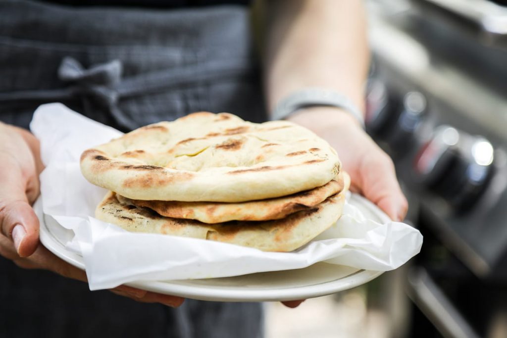 The best pizza dough! So easy to make (no kneading) and tastes similar to white flour (but it's a lot healthier for you). Einkorn pizza dough! Grill it for flatbreads or bake it in the oven for pizza.