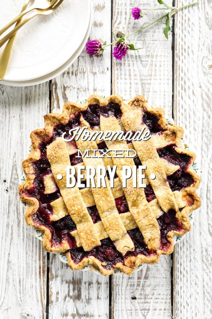 A homemade mixed berry pie featuring frozen (summer) berries and a flaky, homemade crust.