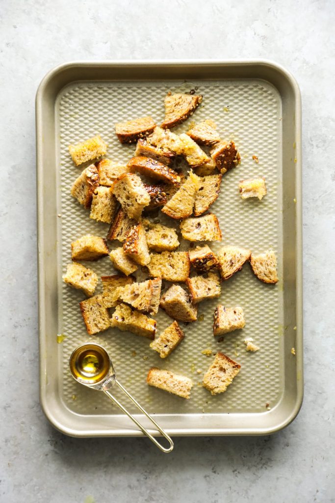 The BEST caesar salad I've ever had! So creamy. Made with real food ingredients. And the salad is super easy to make (including the homemade croutons).