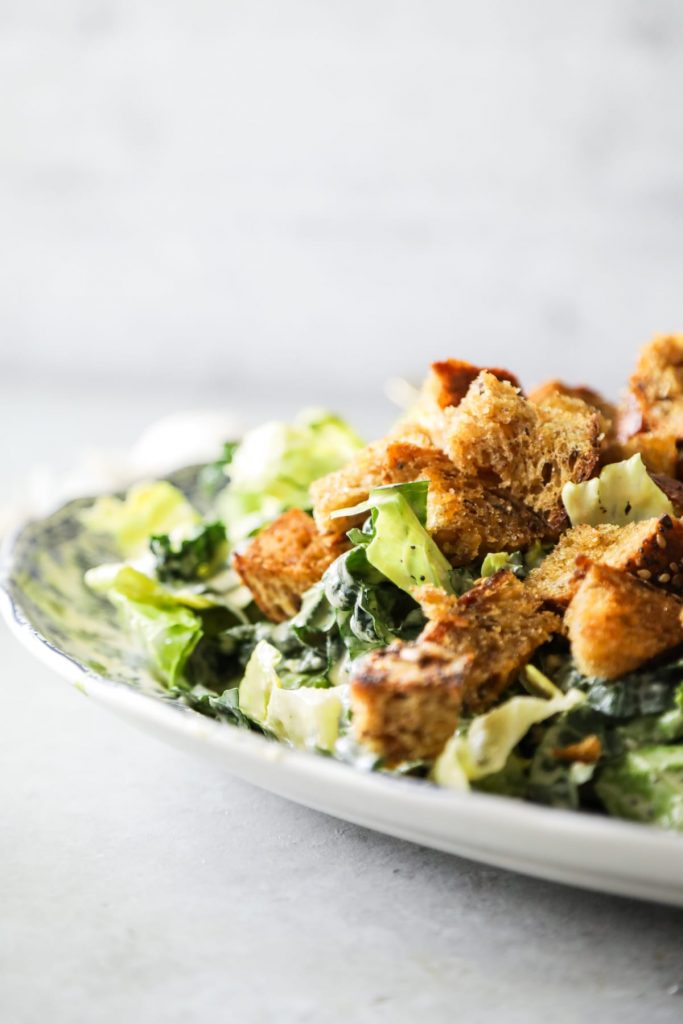 The BEST caesar salad I've ever had! So creamy. Made with real food ingredients. And the salad is super easy to make (including the homemade croutons).