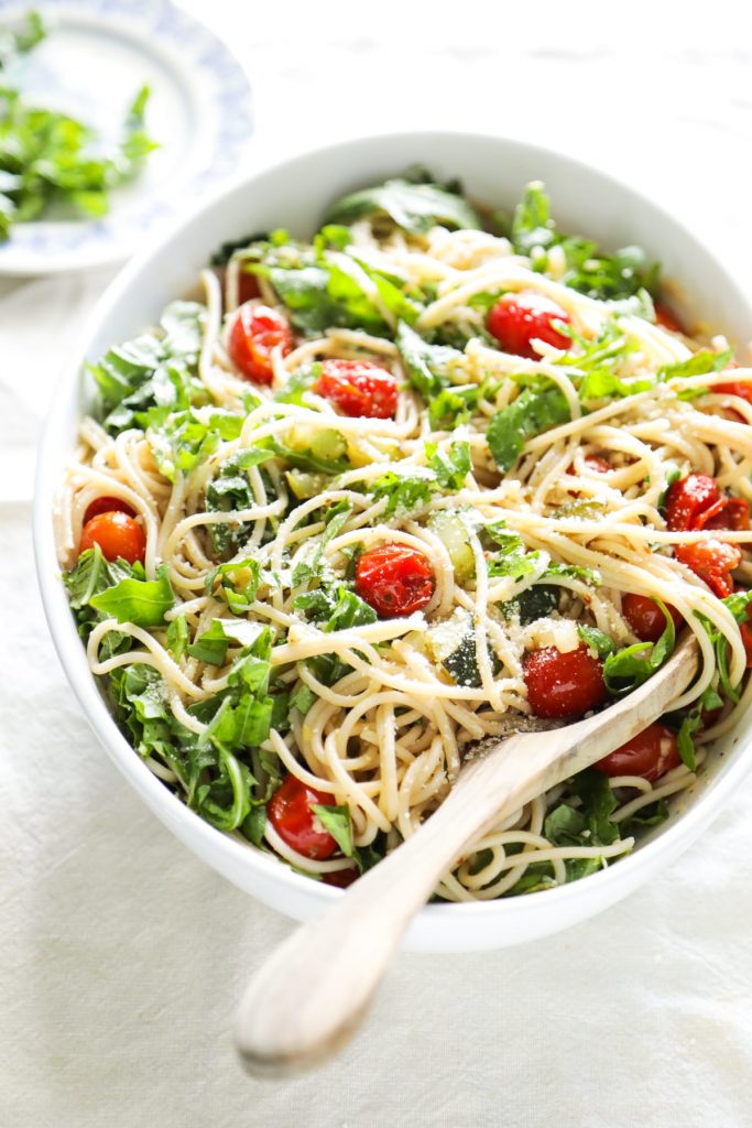 My absolute favorite pasta! This summer pasta with 'burst' tomatoes, zucchini, and arugula is so easy to make. Just cook the veggies and noodles, and mix together.