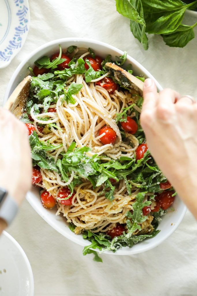 My absolute favorite pasta! This summer pasta with 'burst' tomatoes, zucchini, and arugula is so easy to make. Just cook the veggies and noodles, and mix together.