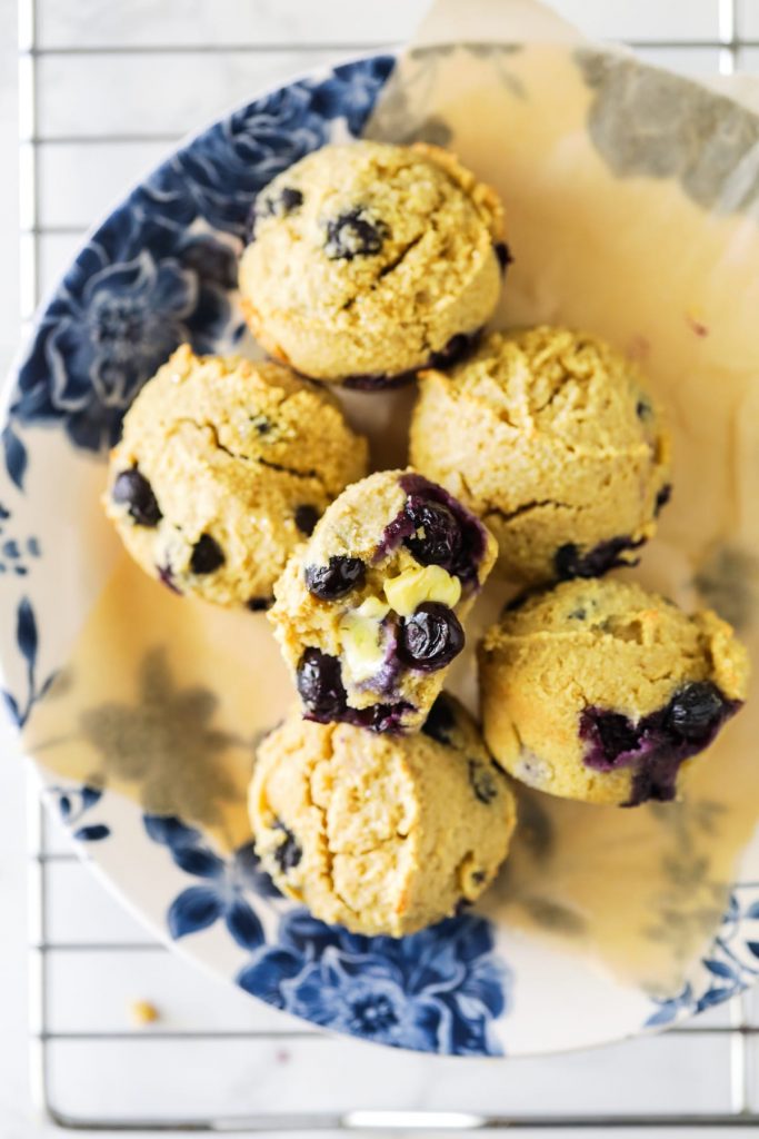 These naturally-sweetened, gluten-free blueberry almond-oat muffins taste like homemade blueberry pancakes. Prep these real-food muffins for an easy, grab-n-go breakfast or snack option.