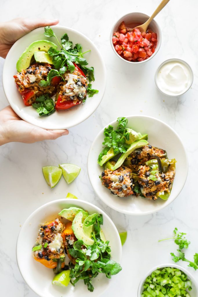 Hearty, vegetarian-stuffed peppers with a Tex-Mex-style filling of beans, rice, salsa, and taco seasonings. Make this meal for dinner, or prep the peppers in advance for a real-food lunch.