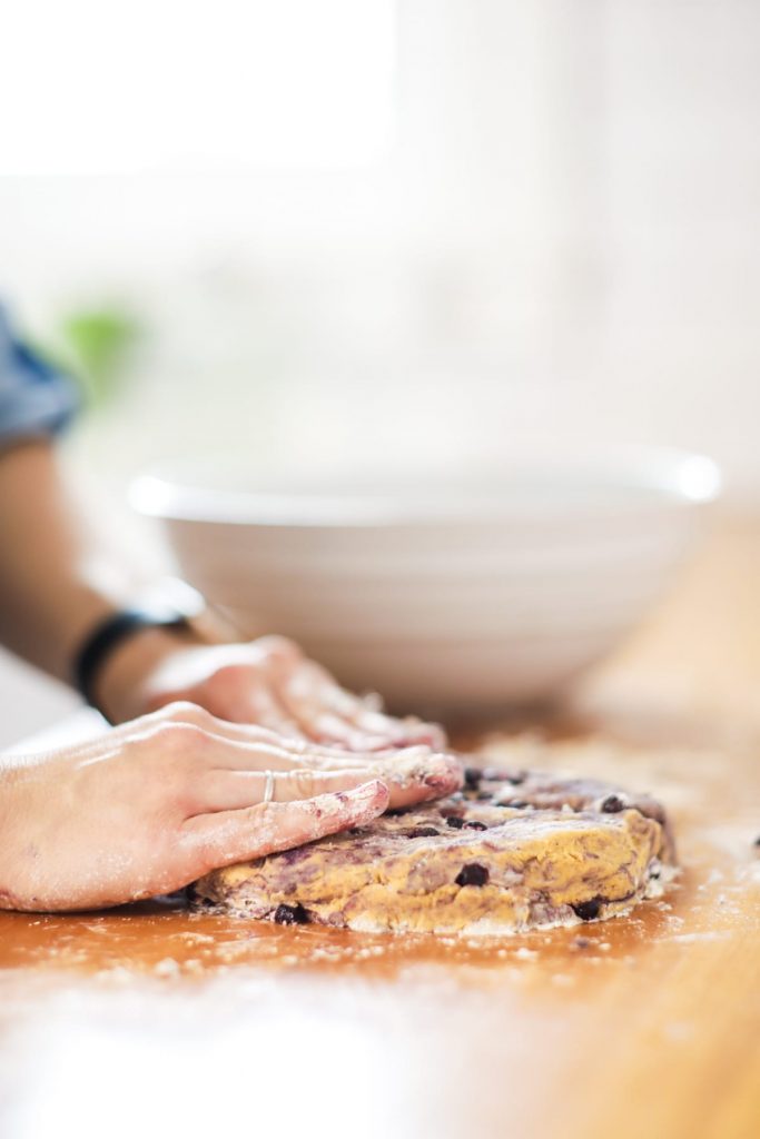 Homemade blueberry scones made with einkorn flour and naturally sweetened with maple syrup. The main sweetness and flavor comes from the lemon glaze, so don't skip it.