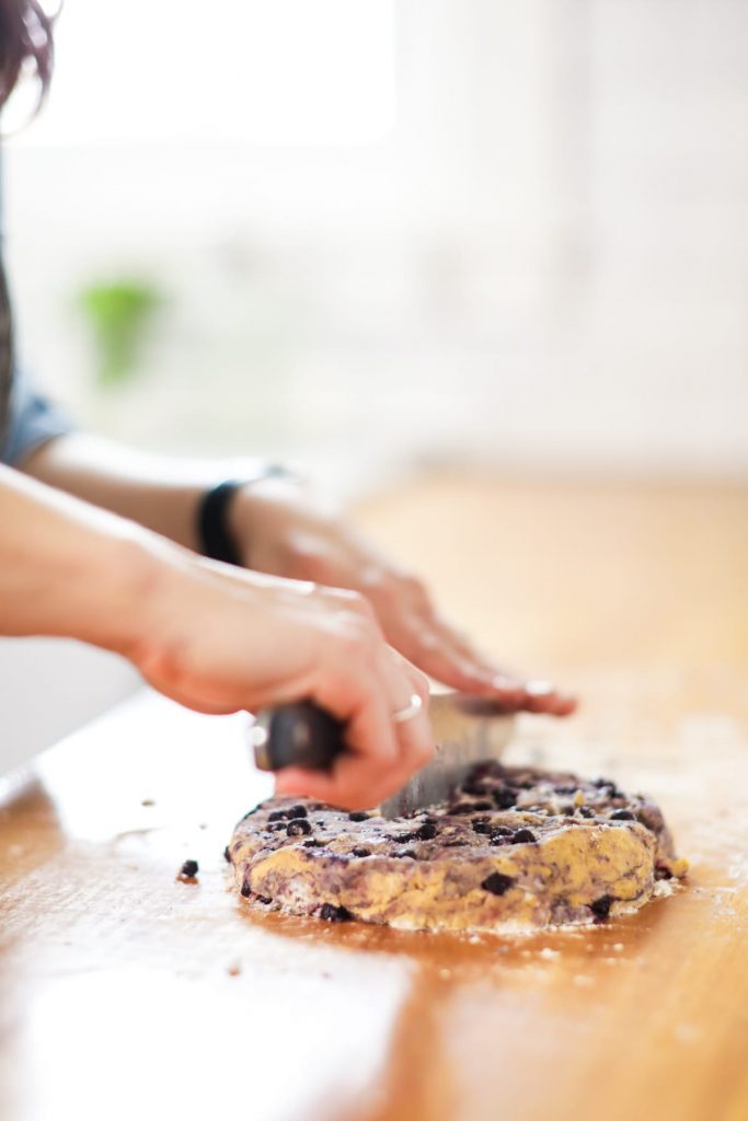 Homemade blueberry scones made with einkorn flour and naturally sweetened with maple syrup. The main sweetness and flavor comes from the lemon glaze, so don't skip it.