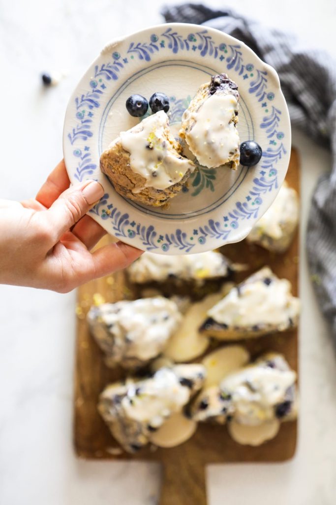 Homemade blueberry scones made with einkorn flour and naturally sweetened with maple syrup. The main sweetness and flavor comes from the lemon glaze, so don't skip it.