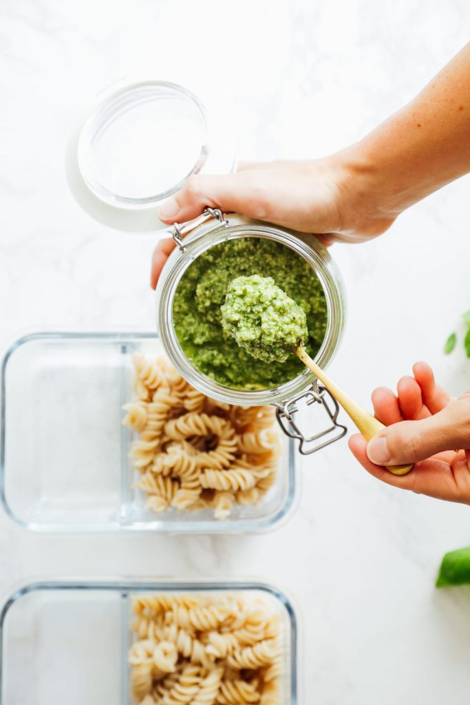 From-scratch pesto is combined with pasta, chicken, and roasted veggies for a make-ahead pasta bowl-style meal. Easy, fresh, real, and make-ahead friendly!
