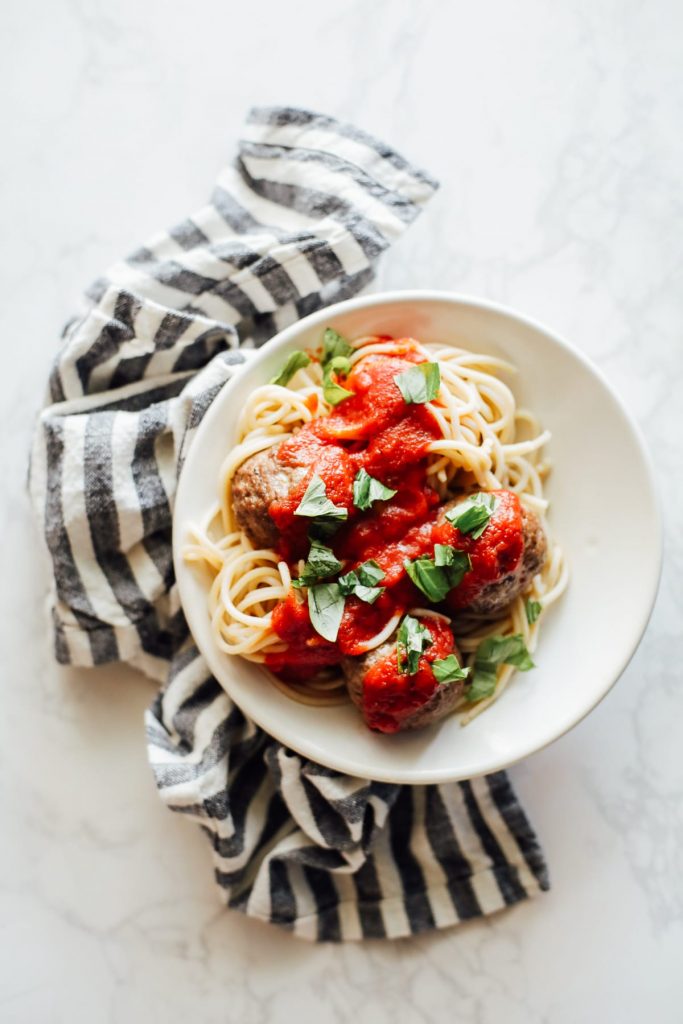 Homemade meatballs that feel decadent, but are easy to make even on a busy weeknight. Pair the oven-baked meatballs with the simple homemade sauce.