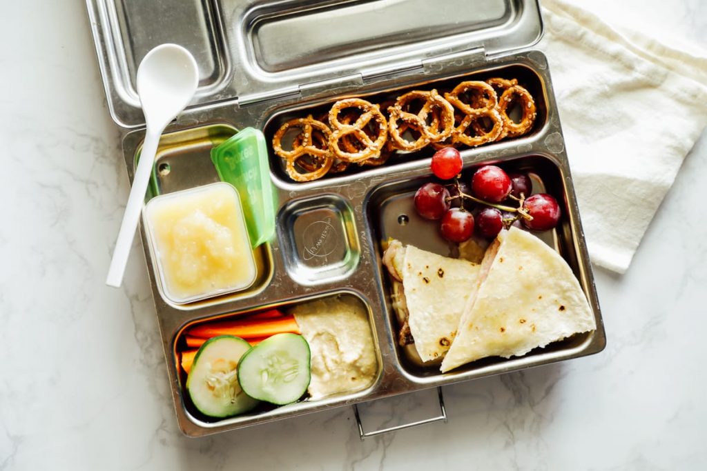 How to simplify packing school lunch with a rotational meal plan. How to create a rotational meal plan and use this list to build nourishing lunches.