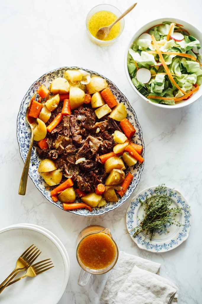 The perfect one-pot roast with root vegetables and homemade gravy, made in the Instant Pot. The best, easiest way to make beef pot roast and veggies.