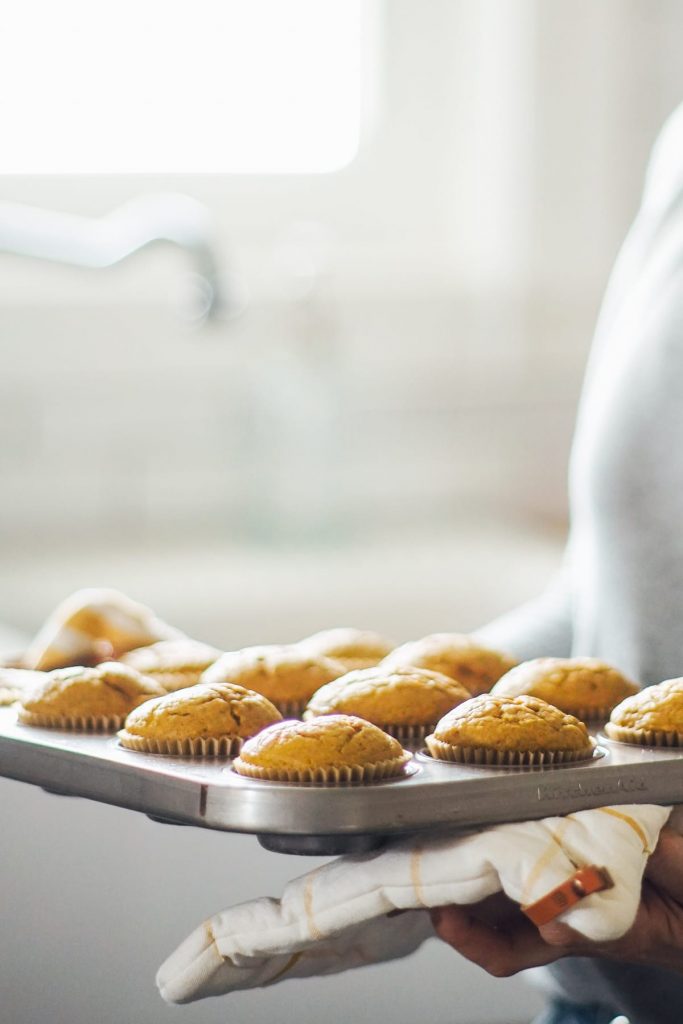 Homemade pumpkin spice muffins made with einkorn flour, pumpkin, a natural sweetener, and pumpkin pie spice.