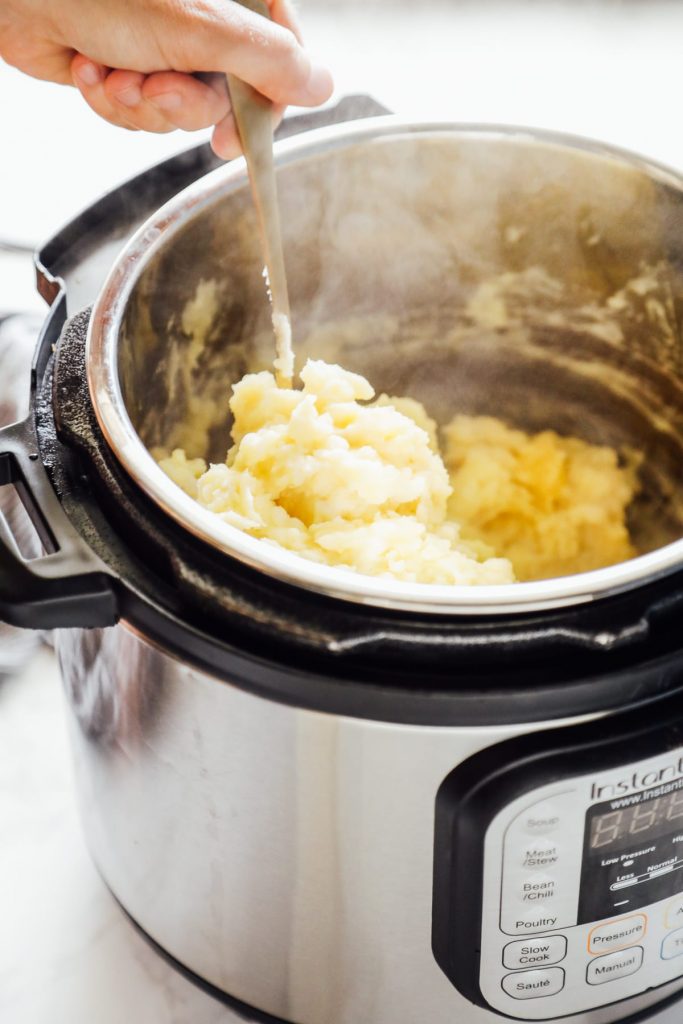 Super easy, one-pot, no-drain Instant Pot mashed potatoes. The easiest potatoes you'll ever make.